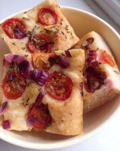 Focaccia with tomatoes, red onion and rosemary